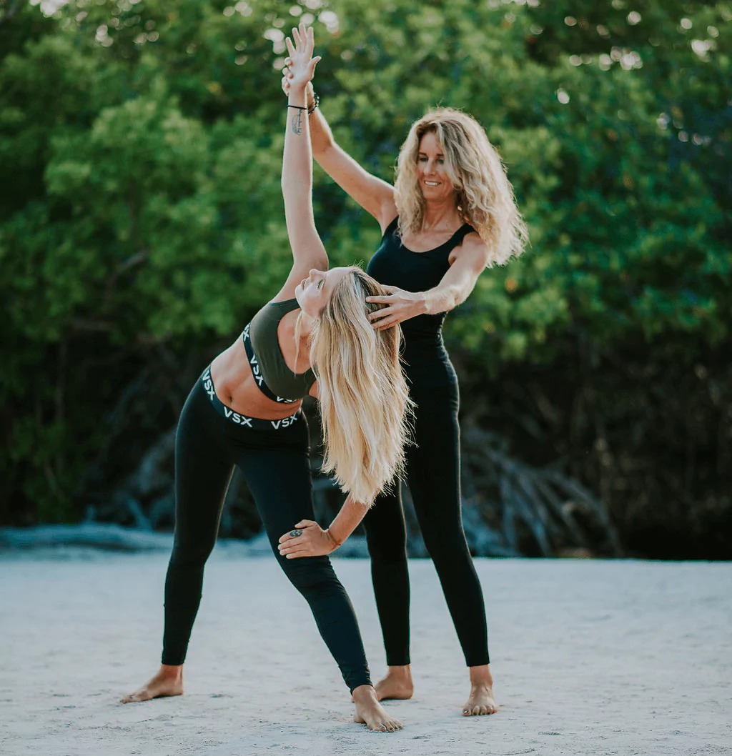 Image of Alexandra & Student doing Yoga and Qigong